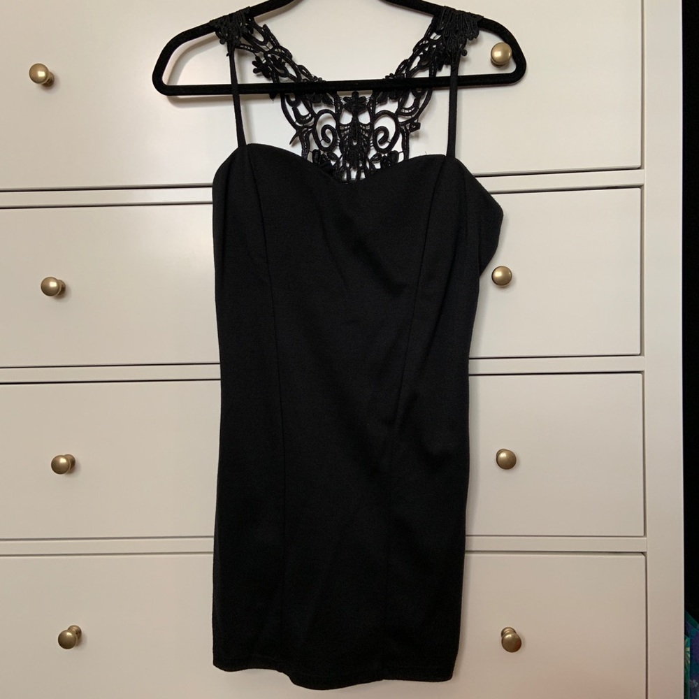 Black backless mini dress with lace backing